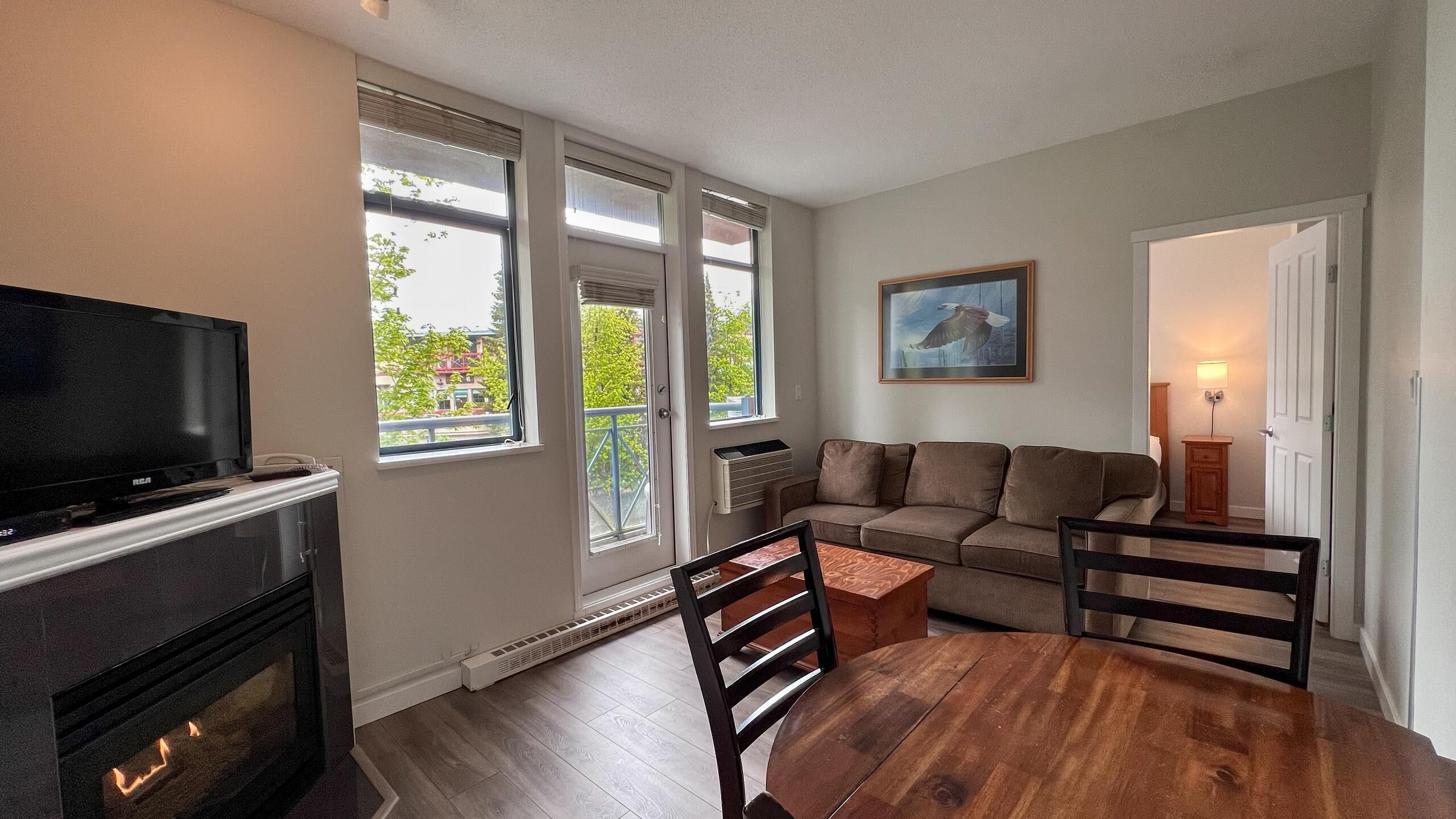 one bedroom | living area | 50-cm flat-screen tv with cable channels, tv, fireplace