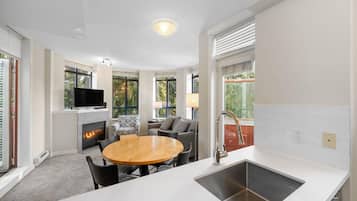 One Bedroom with Private Hot Tub | Living area | 50-cm flat-screen TV with cable channels, TV, fireplace