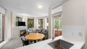 One Bedroom with Private Hot Tub | Living area | 50-cm flat-screen TV with cable channels, TV, fireplace