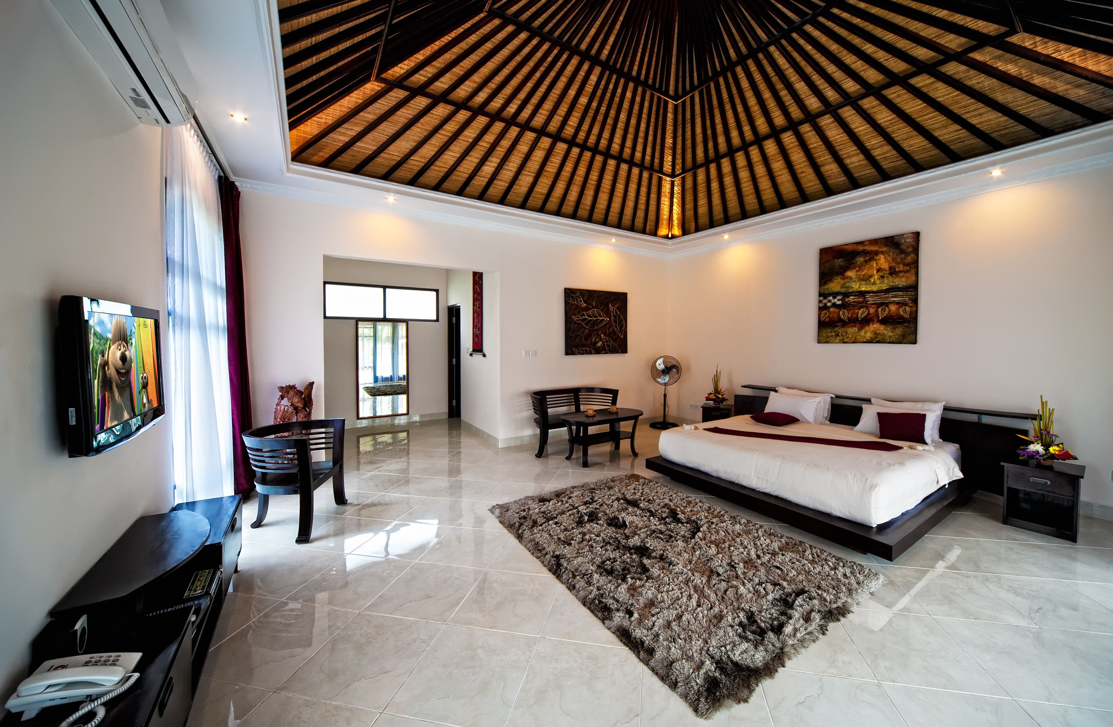 bungalow suite | living room | plasma tv, dvd player