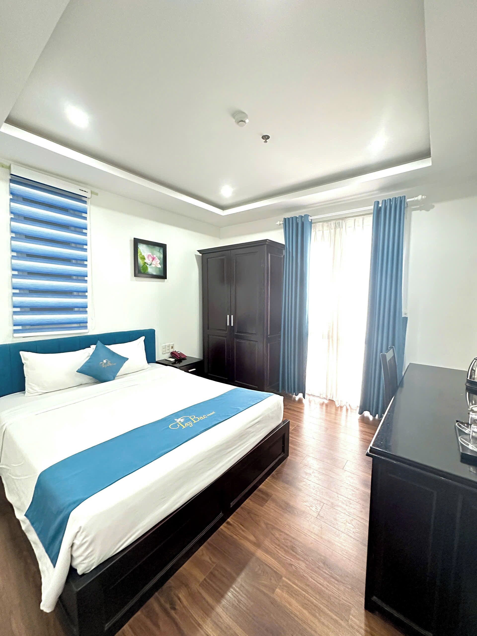 Standard Double Room, City View | Minibar, desk, laptop workspace, blackout drapes