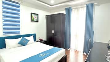 Standard Double Room, City View | Minibar, desk, laptop workspace, blackout drapes