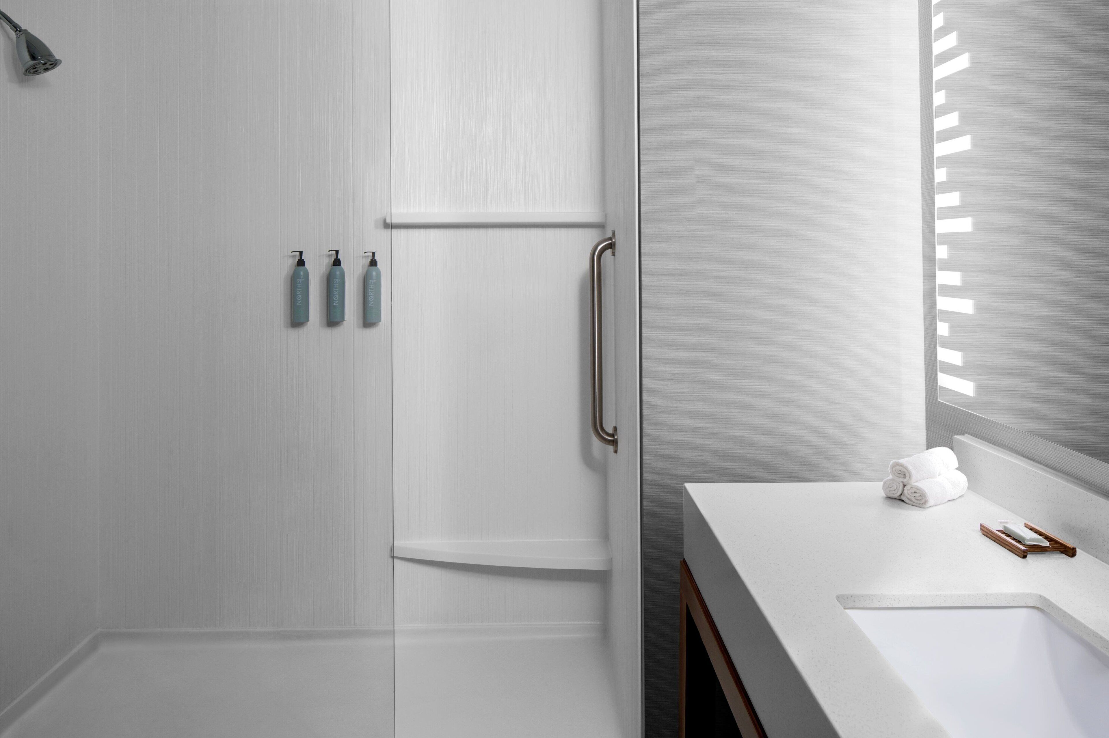 shower, free toiletries, hair dryer, towels