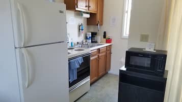 Suite, Non Smoking | Private kitchen | Fridge, microwave
