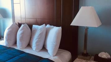 Premium bedding, pillow-top beds, blackout curtains, free WiFi