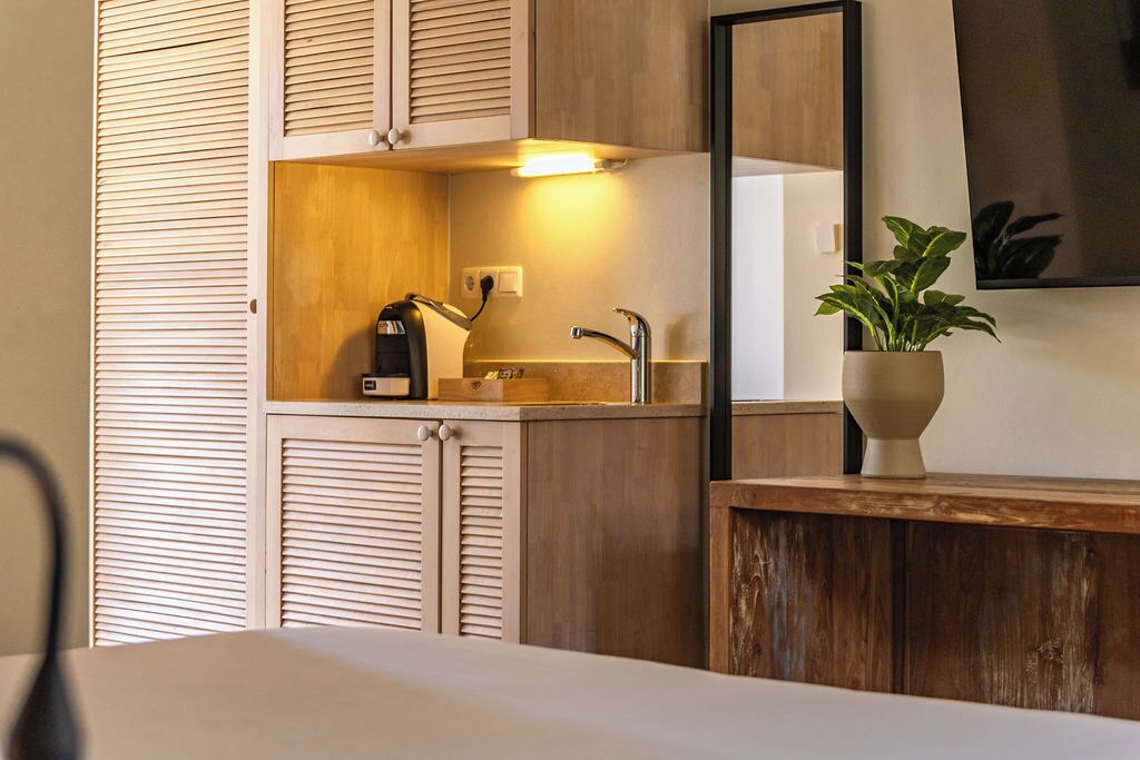 fridge, coffee/tea maker, electric kettle, paper towels