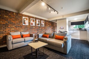 Two Bedroom Aparment | Living area | 40-inch TV with digital channels - Nightcap at Manhattan Hotel (Ringwood)