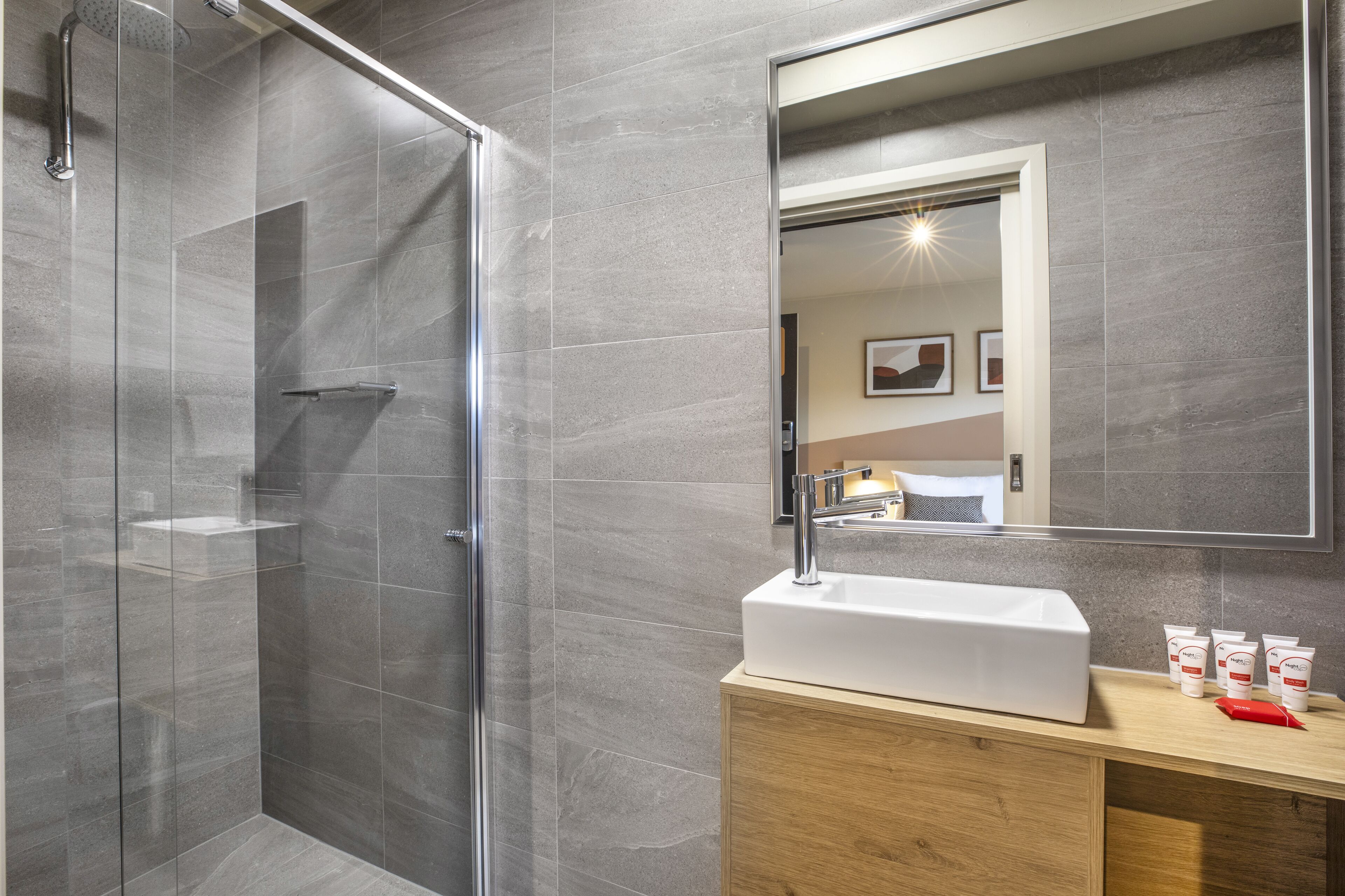 compact queen | bathroom | shower, rainfall showerhead, free toiletries, hair dryer