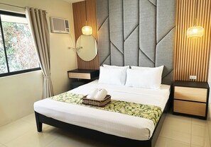 Family Room, 2 Bedrooms (Casitas) | Minibar, bed sheets - Puerto Del Sol Beach Resort (Bolinao)