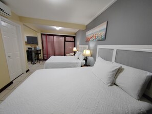 Superior Room, 2 Double Beds | Premium bedding, down comforters, pillowtop beds, individually decorated - Hotel Bamboo Aeropuerto (Alajuela)