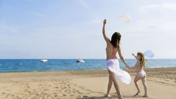 Private beach nearby, free beach shuttle, sun-loungers, beach umbrellas