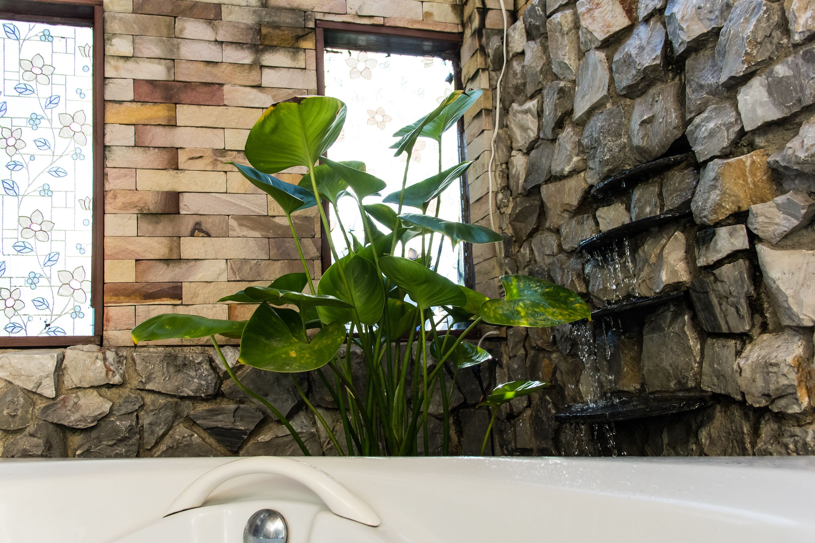 superior room | bathroom | rainfall showerhead, hair dryer, bathrobes, towels