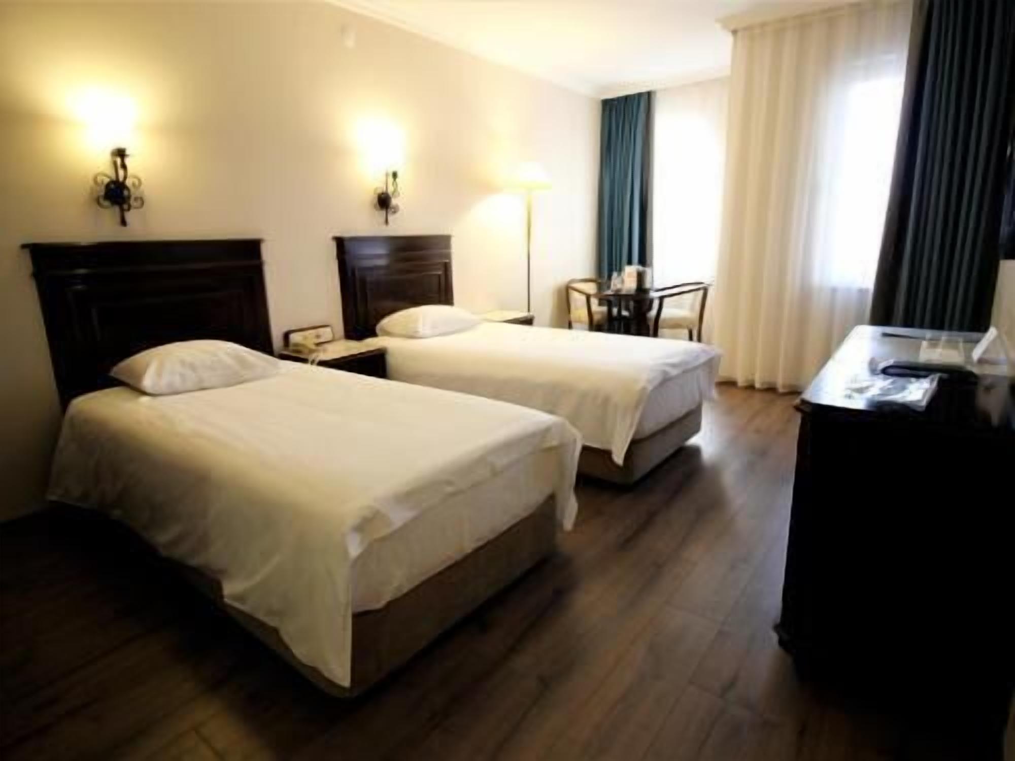 Ropa de cama de alta calidad, minibar, escritorio y cortinas blackout 