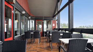 Breakfast, lunch served; local cuisine, al fresco dining