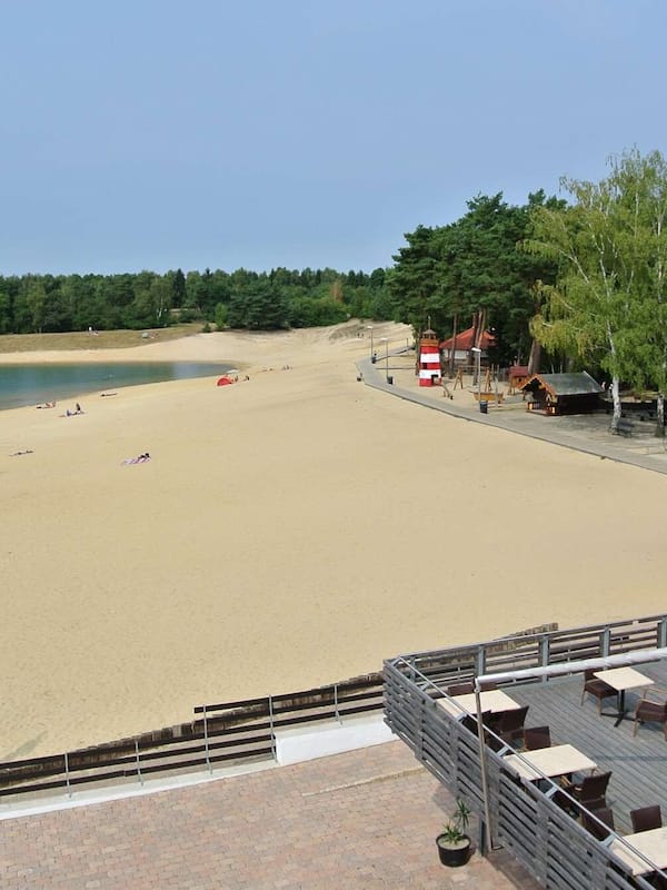 On the beach, white sand, water skiing, beach volleyball