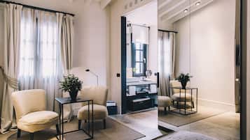 Designer toiletries, hair dryer, bathrobes, slippers
