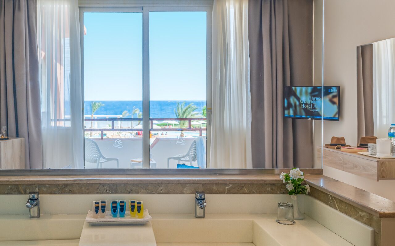 premium room, sea view | 1 bedroom, in-room safe, desk, blackout curtains