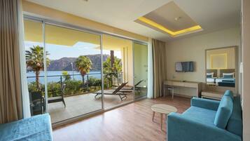 Grand Quadruple Room, 1 Bedroom, Sea View | Premium bedding, minibar, in-room safe, desk