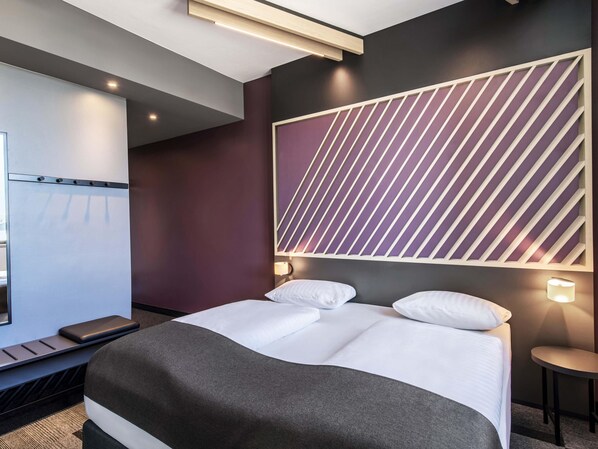 Premium bedding, pillow-top beds, desk, blackout curtains