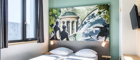 Premium bedding, pillowtop beds, desk, blackout drapes