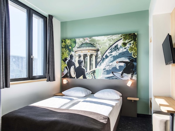 Premium bedding, pillow-top beds, desk, blackout curtains