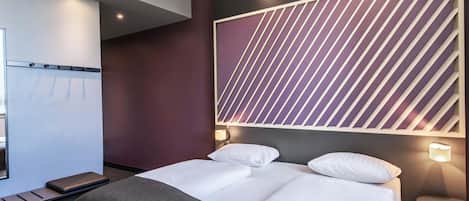 Premium bedding, pillowtop beds, desk, blackout drapes