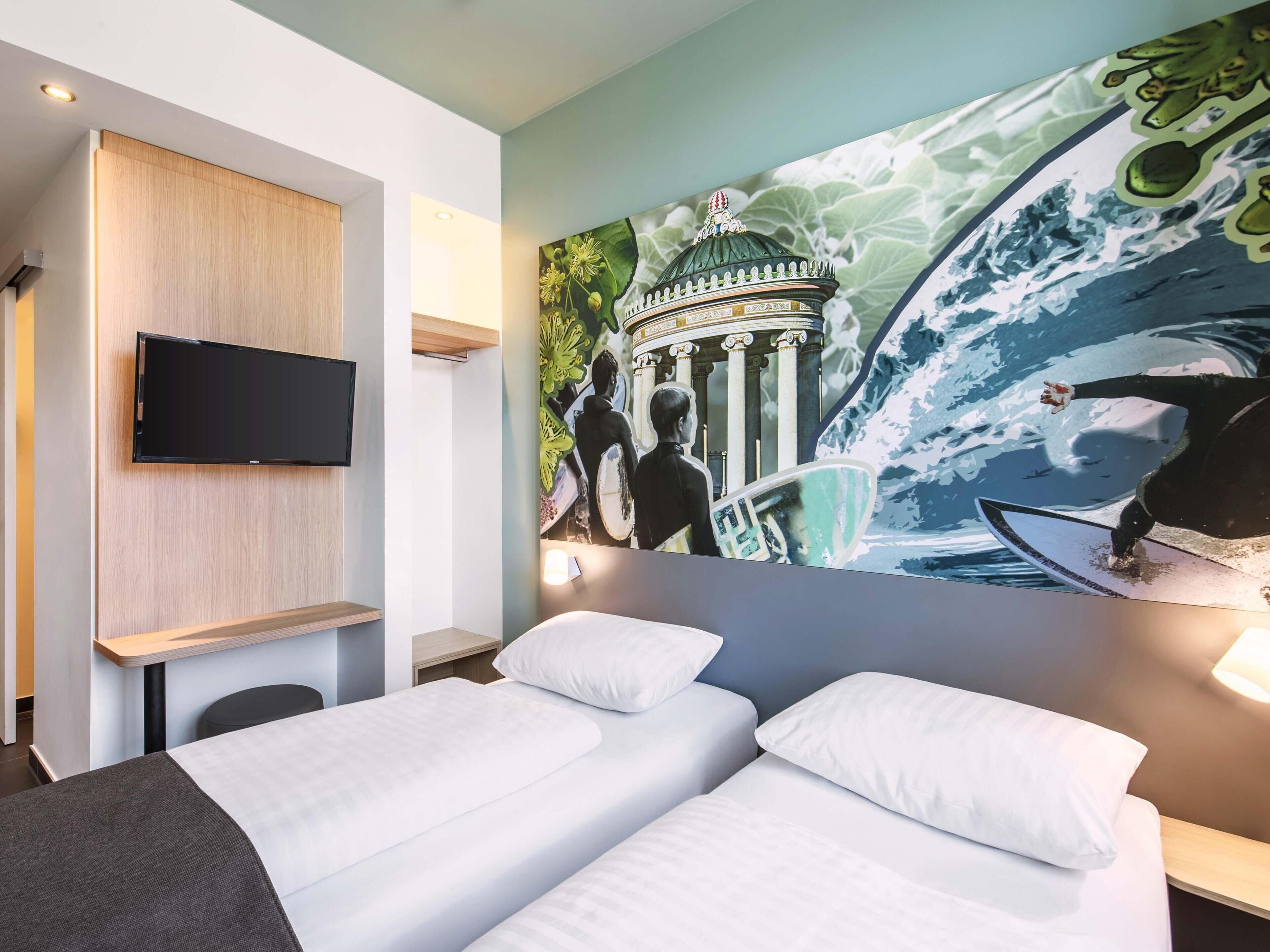 Premium bedding, pillow-top beds, desk, blackout curtains