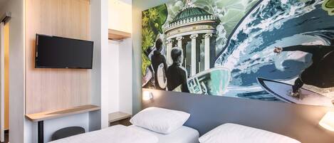 Premium bedding, pillow-top beds, desk, blackout curtains