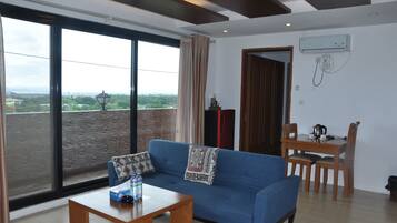 32-inch flat-screen TV with satellite channels, TV