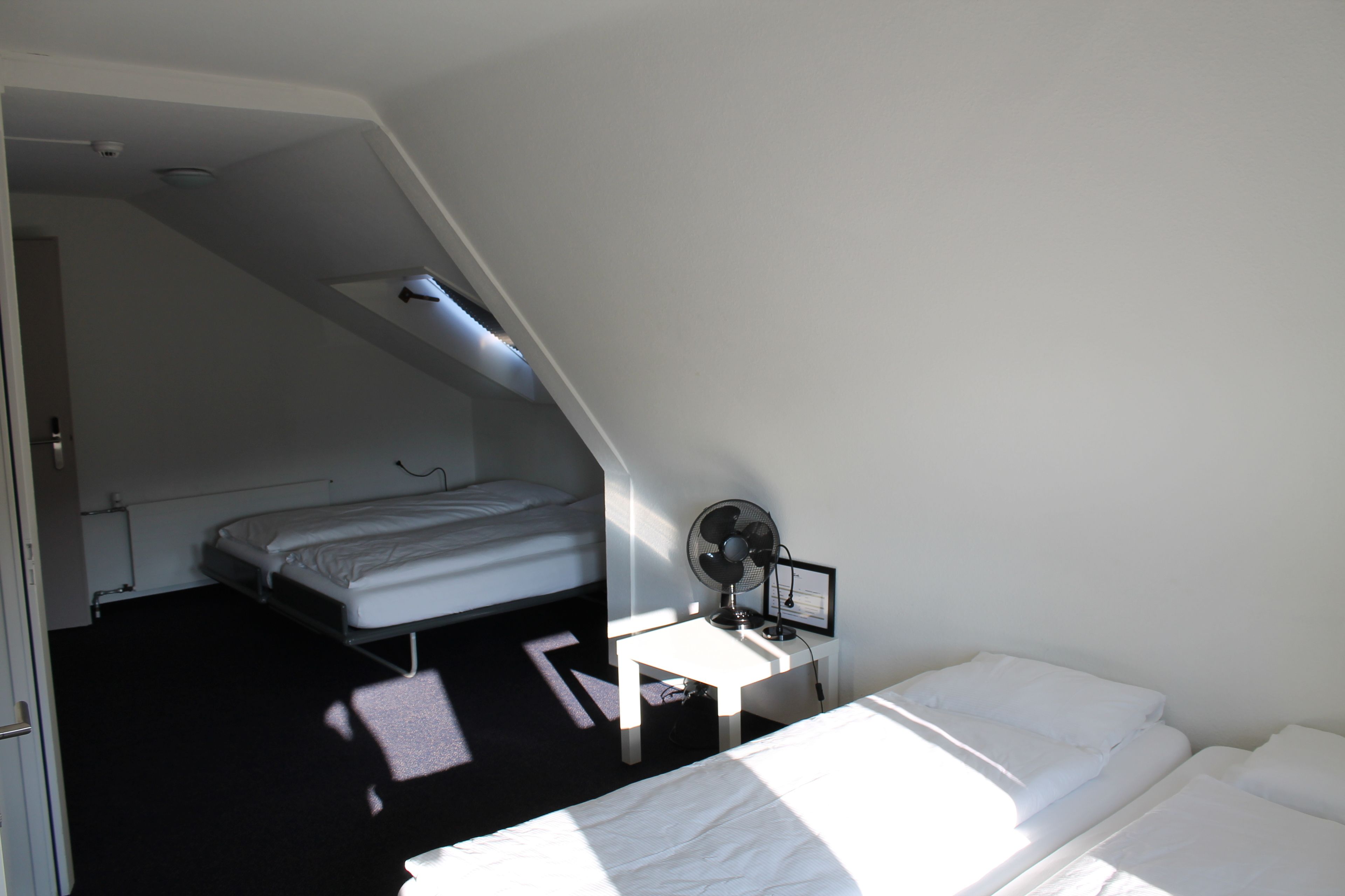 family room | desk, laptop workspace, blackout curtains, soundproofing