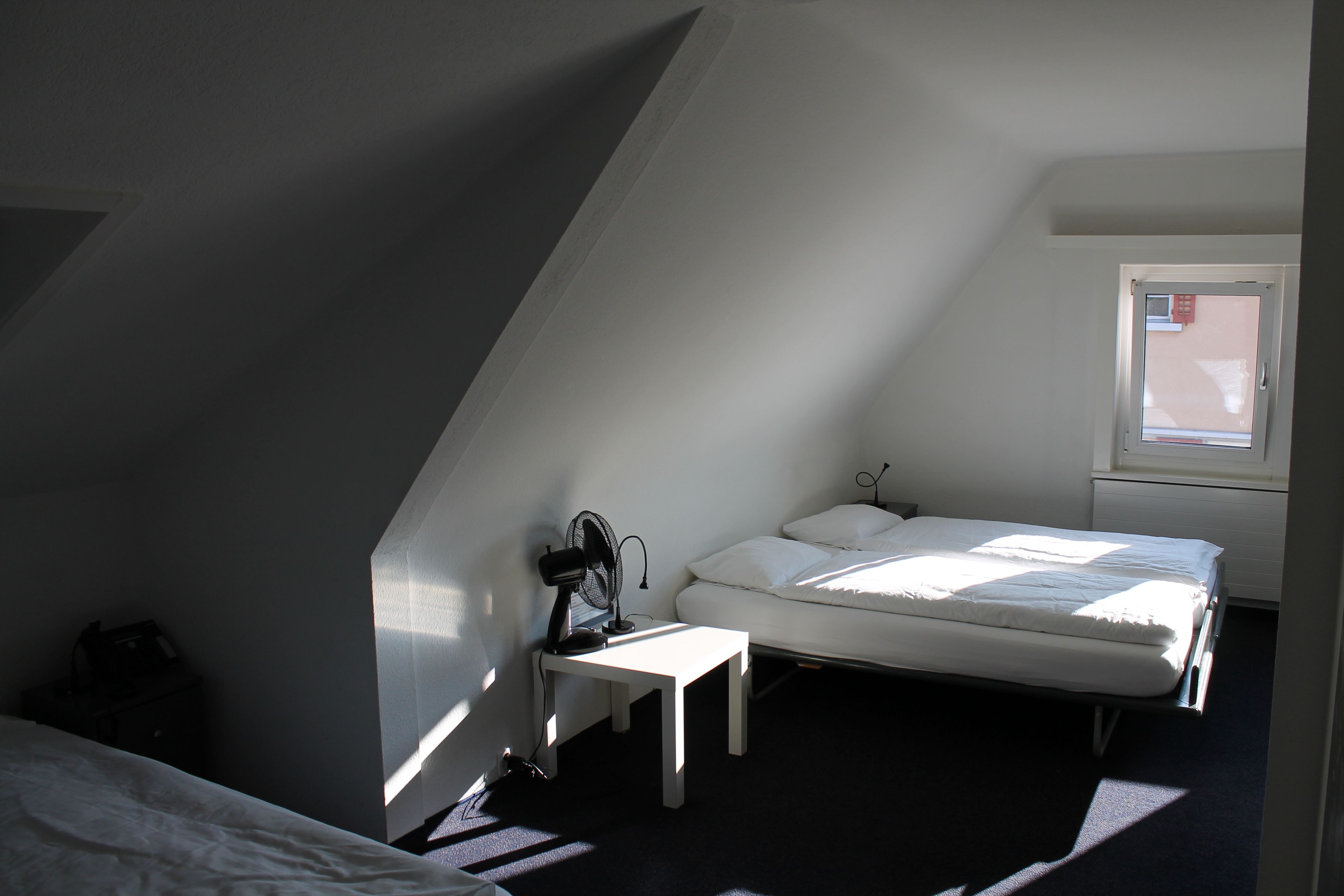 family room | desk, laptop workspace, blackout curtains, soundproofing