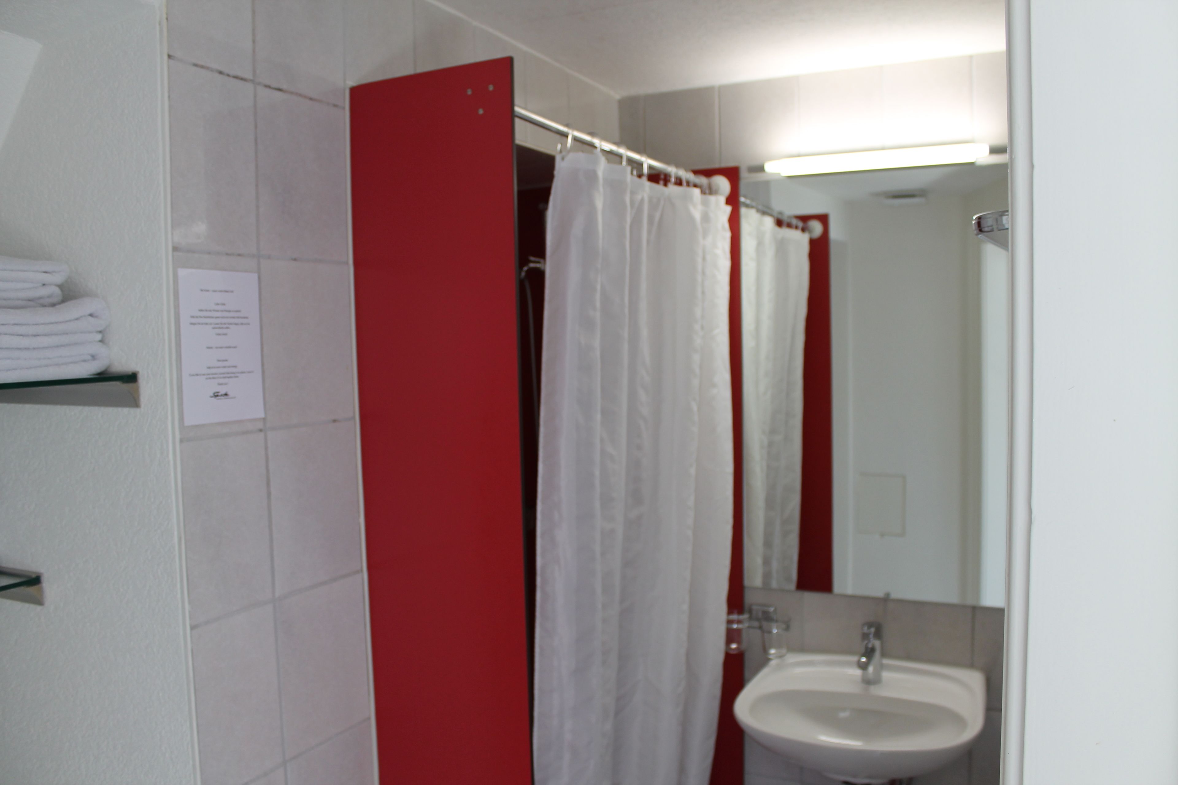 family room | bathroom | shower, hair dryer, towels