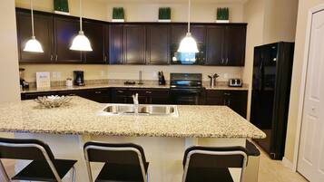 Private Home, 4 Bedroom, Pool | Private kitchen | Full-sized fridge, microwave, stovetop, dishwasher