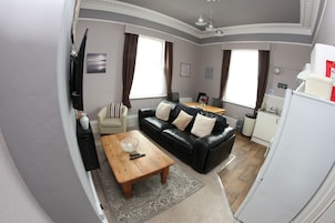 Apartment, 2 Bedrooms (Apartment 6) | Living area | 43-inch Smart TV with digital channels, TV