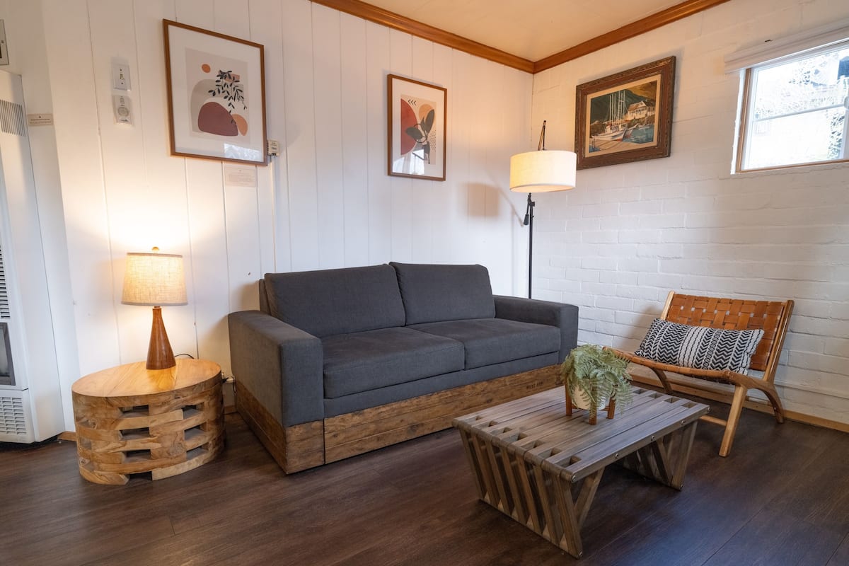 Suite | Living area | 40-inch flat-screen TV with cable channels, TV, DVD player