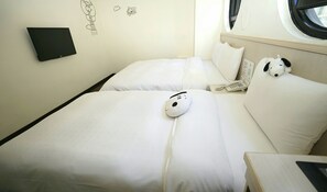 A hotel room with two beds, a wall-mounted TV, and a window with a view of the sky. - Century Hotel (Kaohsiung)