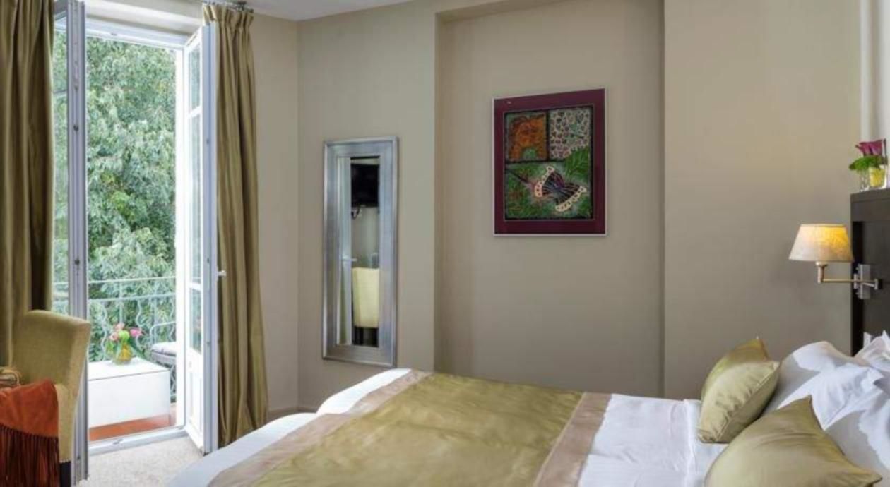 privilege room with balcony | premium bedding, in-room safe, desk, blackout curtains