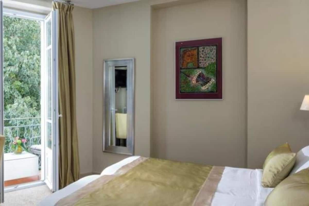 privilege room with balcony | premium bedding, in-room safe, desk, blackout curtains