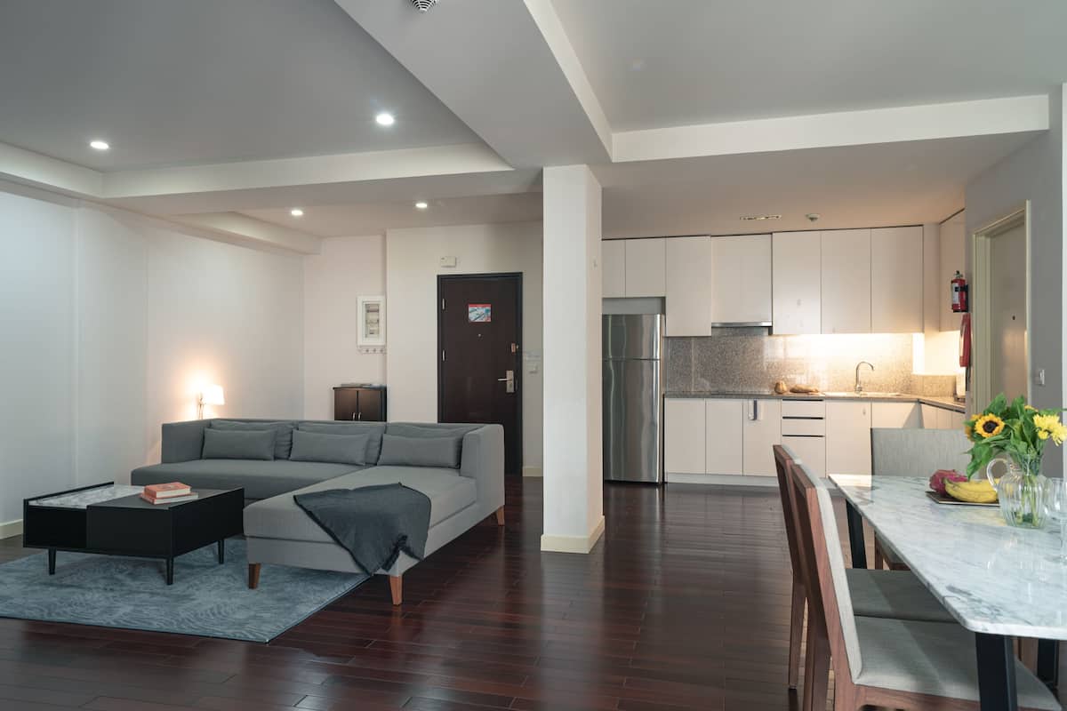 three-bedroom condo | living area | flat-screen tv