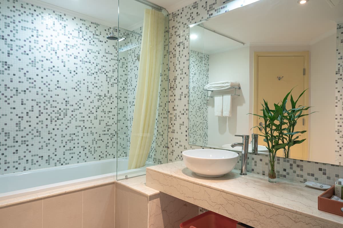 three-bedroom condo | bathroom | free toiletries, hair dryer, bathrobes, slippers