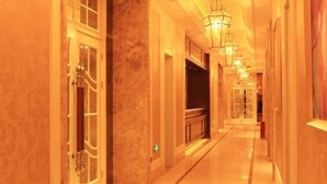 A long, well-lit corridor with doors on both sides, leading to rooms. - Shansong Hotel Shunchang (Shunchang)