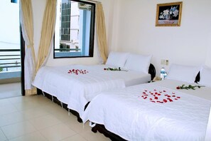 Standard Quadruple Room | Minibar, blackout drapes, free WiFi - HT3 Hotel (Nha Trang)