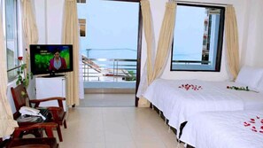 Kamar Quadruple | Minibar, brankas, tirai kedap cahaya, dan Wi-Fi gratis