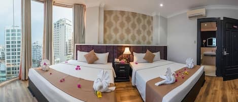 2 habitaciones, ropa de cama de alta calidad, cubrecamas y minibar