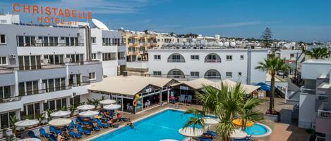 Seasonal outdoor pool, pool umbrellas, pool loungers