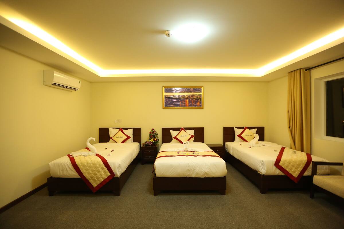 Deluxe Triple Room | Premium bedding, minibar, desk, blackout drapes