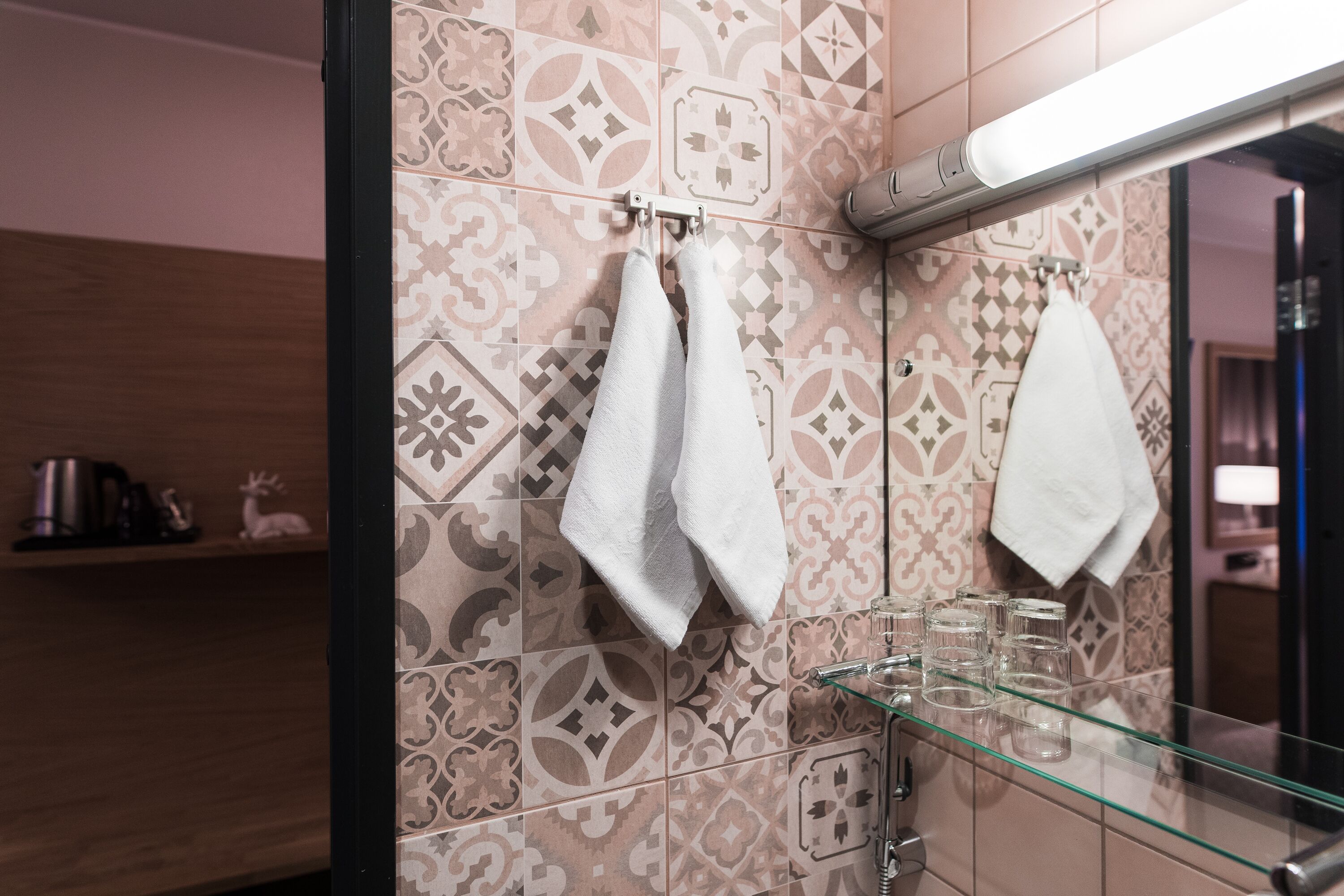 superior twin room | bathroom | shower, hair dryer, towels, soap