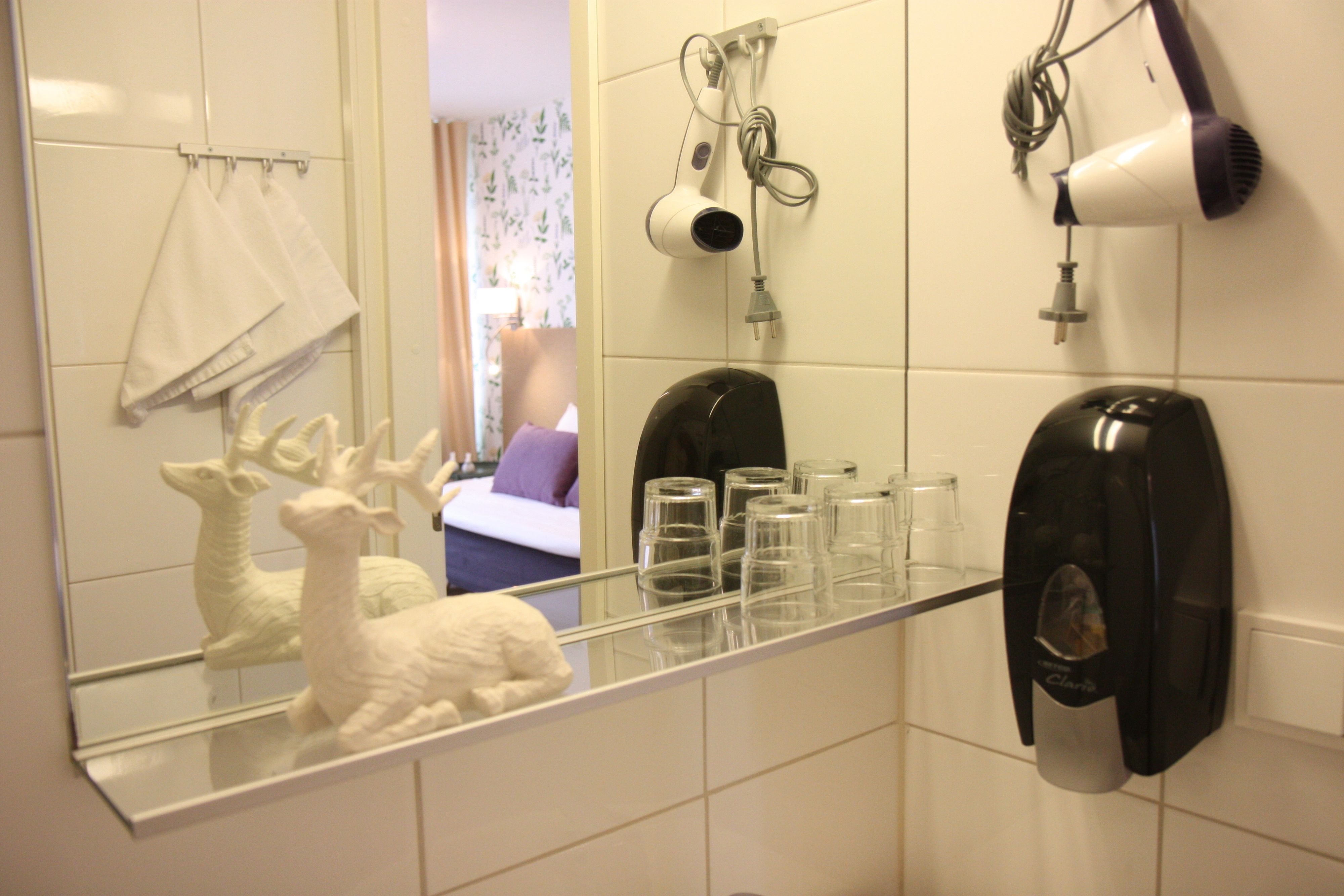 triple room | bathroom | shower, hair dryer, towels, soap