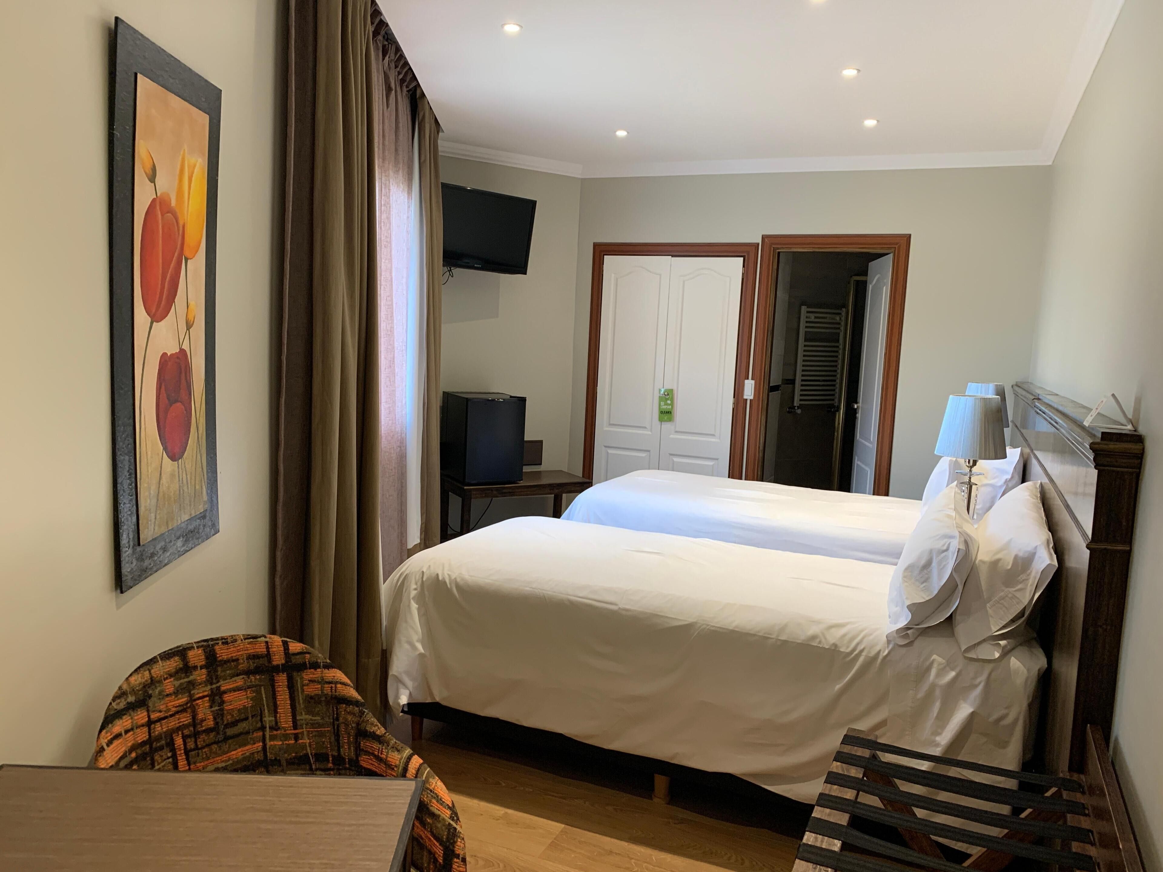Premium bedding, down duvets, minibar, in-room safe