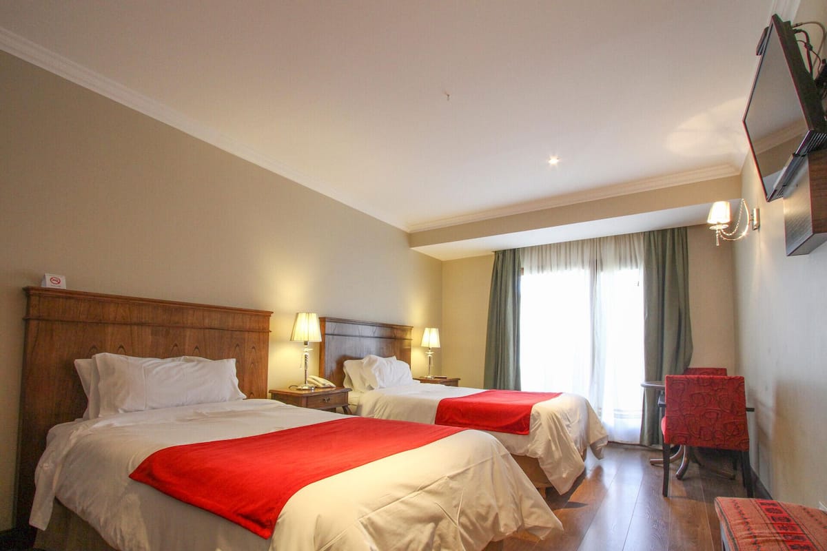 1 Schlafzimmer, hochwertige Bettwaren, Daunenbettdecken, Minibar